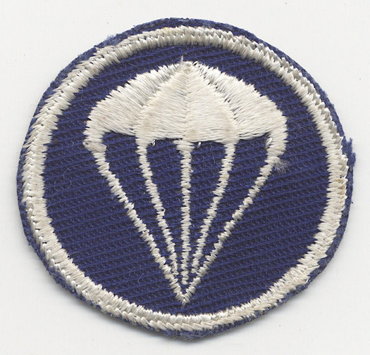 Early WWII US Army Parachute Field Artillery Cap Badge on Blue Twill