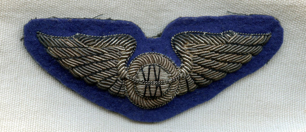 Beautiful WWII UK-Made USAAF Navigator Wing Bullion on Combat Blue Background