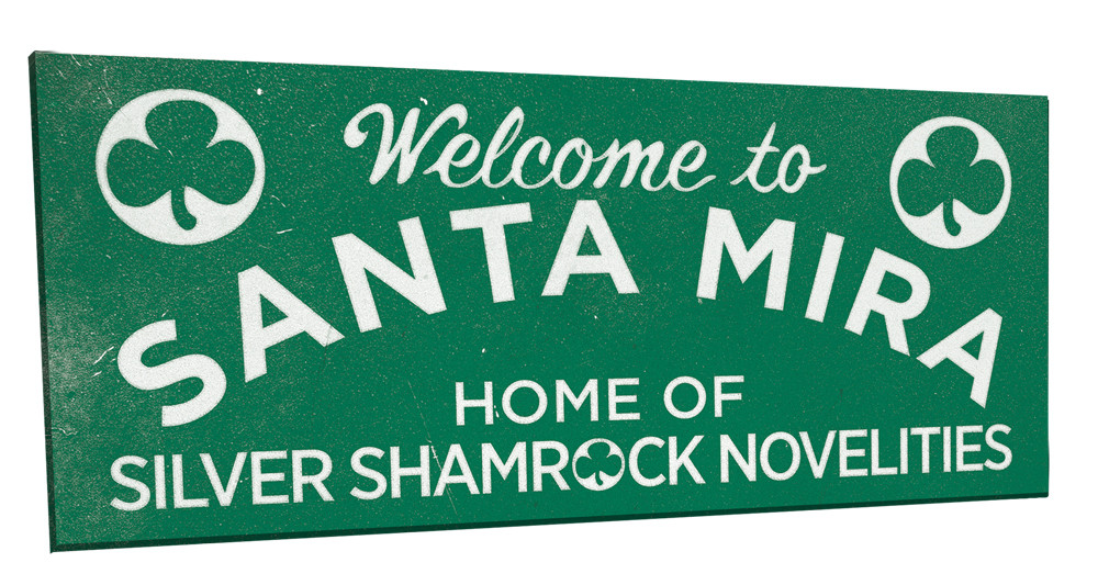 Green rectangular sign reading