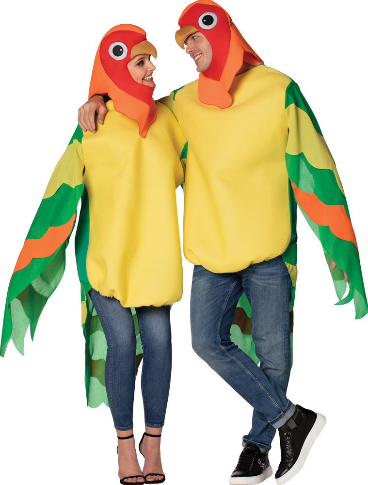 Two adults wearing matching lovebird costumes with yellow tunics, red bird head hoods, and green and orange wing sleeves.