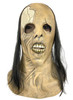 Full-head latex horror mask with wrinkled decayed skin, yellowed exposed teeth, and long straight black hair on a white ba…