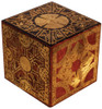 Trick or Treat Studios Lament Configuration puzzle box replica with gold and red engraved geometric patterns on all visibl…