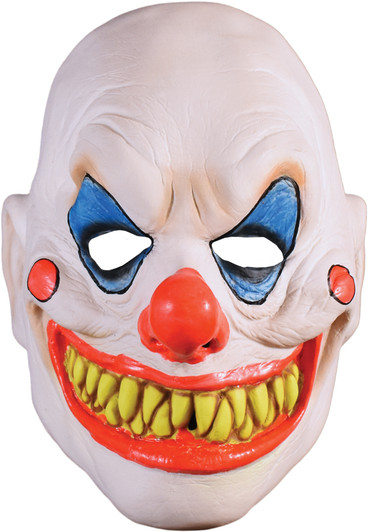 Demented clown Halloween mask with blue eye makeup, red nose, red cheek dots, and wide grinning mouth with yellow teeth.