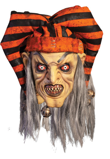 Evil Trickster latex Halloween mask with orange and black striped jester hat, gray hair, red eyes, and a jingle bell chin…