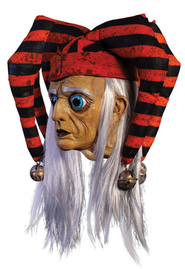 Sad Trickster latex Halloween mask with wrinkled face, blue eye, white hair, red and black striped jester hat with bells.