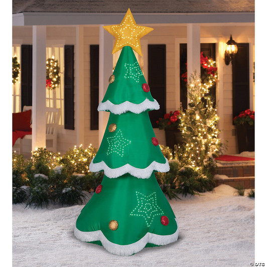 Large green inflatable outdoor Christmas tree with lit star topper, red and gold ornaments, and star light details, displa…