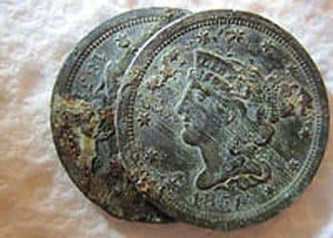 Two 1851 Half Cents Stuck Together