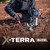 Minelab X-Terra Elite Metal Detector Powered by Multi-IQ lifestyle photo man digging in the dirt 