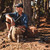 Nokta The Legend Metal Detector  lifestyle photo, man sitting on the ground in a wooded setting