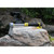 Treasure Products Vibra-Quatic 320 Waterproof Pinpointer resting on a rock in front of waterfall