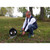 Man kneeling down using a OKM GeoSeeker Mini Water and Cavity Detector in grass