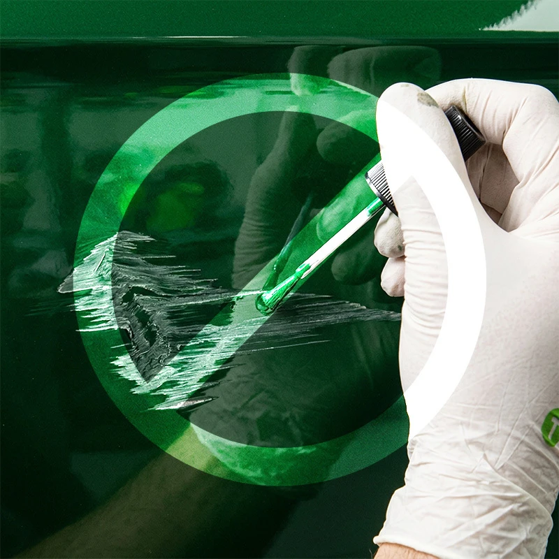 Touch up brush being used on a large damaged area with a symbol indicating the brush is not recommended