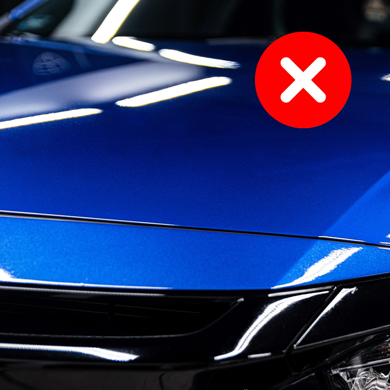 Custom blue vehicle paint representing a color-match claim not covered by the guarantee.
