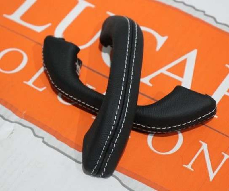 LRC34027 - Defender Leather Interior Door Grab Handle Kit - Black Leather with White Stitch by Lucari Image 1