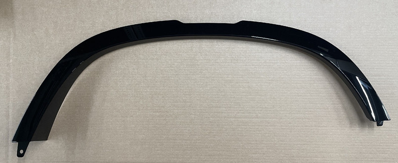 LR147939 - Left Hand Rear Wheel Arch Moulding - In Gloss Black Narvik - for Land Rover Defender 110 / 130 - 2020 Onwards Image 1