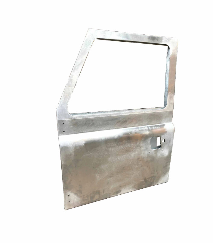 LR8702N/S - L/H Lift Up Handle Front Door - Galvanised Frame Aluminium Skin - Defender 1984-1986 Image 1