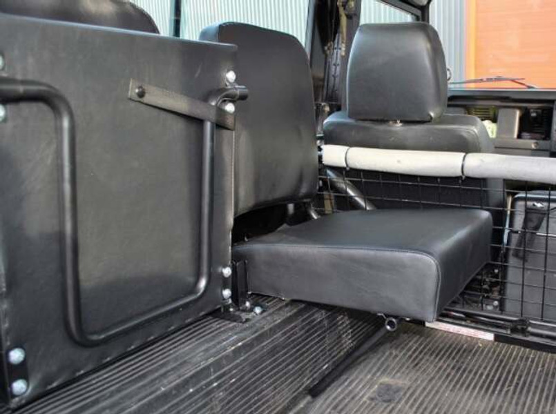 DA4067 - Defender Rear Inward Facing Seat In Black Vinyl - Flip Up Style Seat Image 3