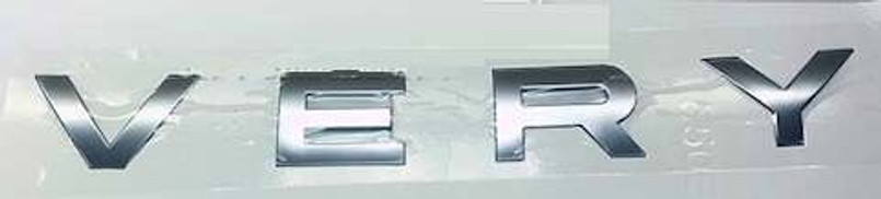 LR063642 - Front Lettering for Discovery Sport - Spells Out V E R Y - In Atlas Grey - Genuine Land Rover Image 1
