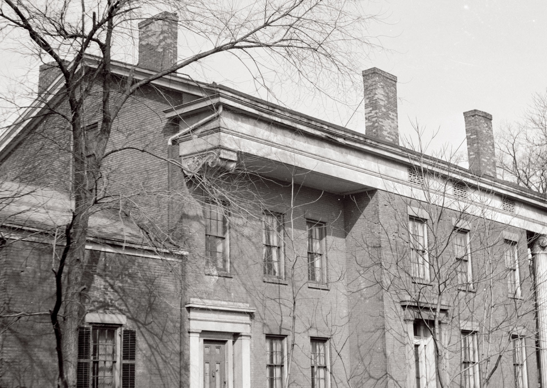Campbell-Whittlesey house overhanging roof with cornice moulding.