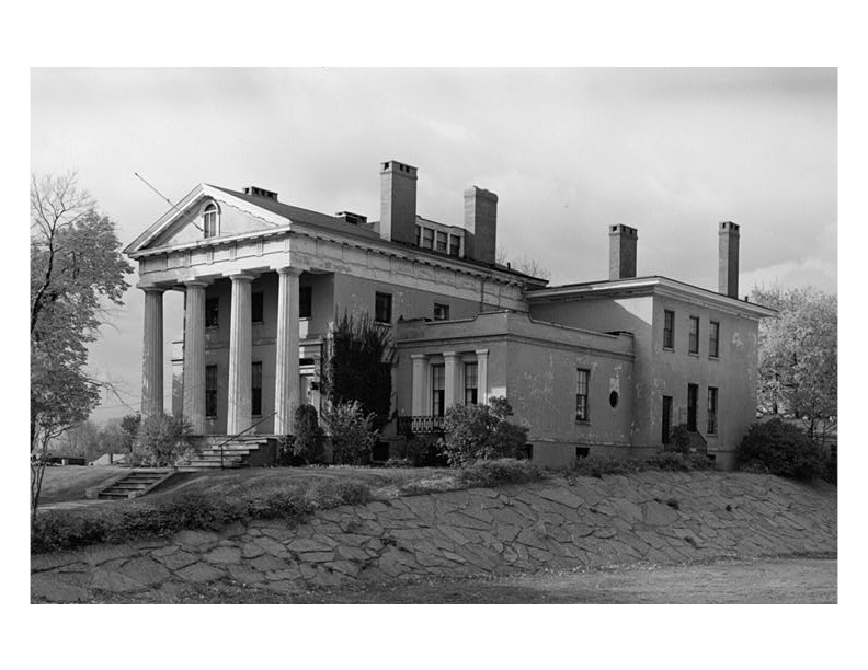 Hervey Ely house features large columns, steps leading to entrance, window mouldings, and brick chimneys.