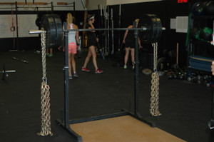 Image of weight bar with Weight Lifting Chains in Gym
