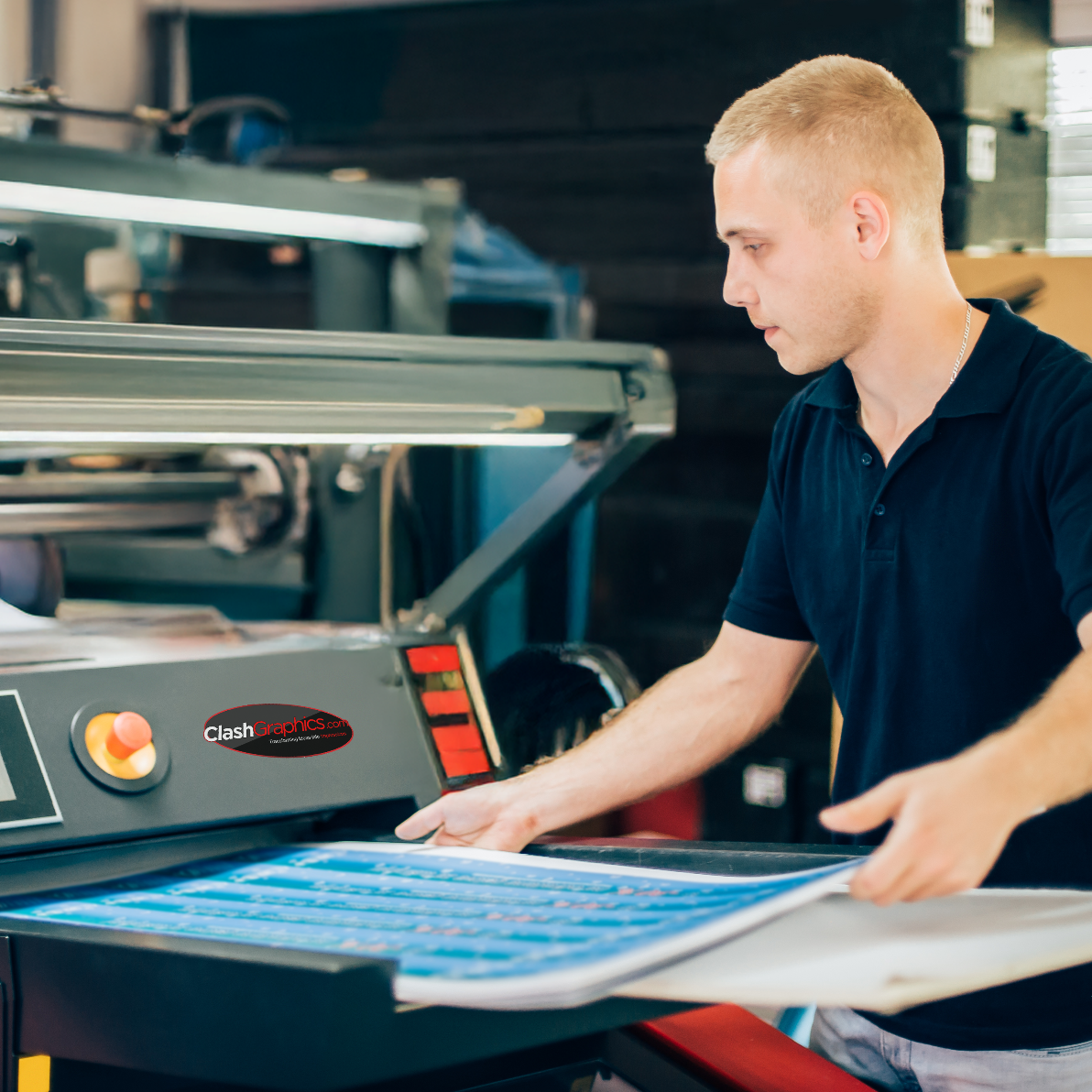 A boy working with a printer
