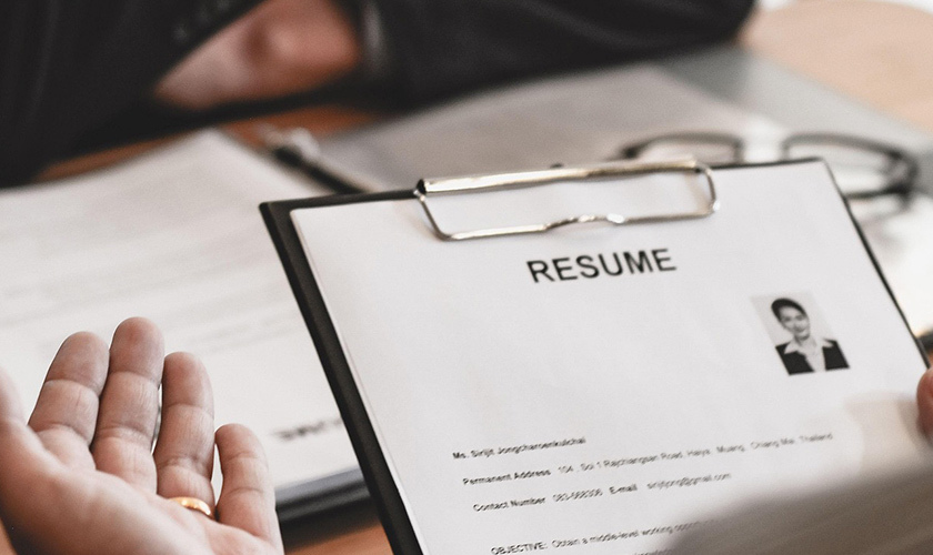 bring your resume and business cards to a job career fair
