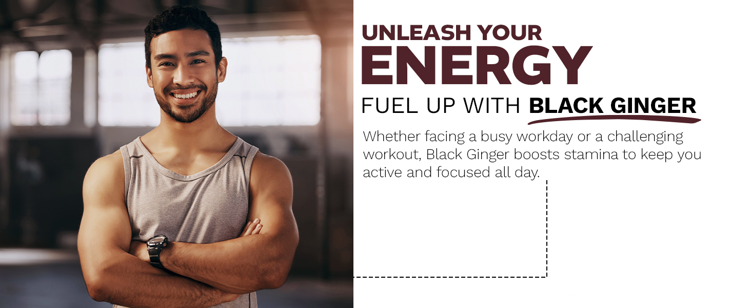 Athletic man in a gym wearing a gray tank top with arms crossed, promoting Black Ginger for energy and stamina enhancement