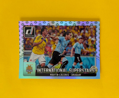 International Superstars #076 Martin Caceres (Uruguay) Panini Donruss Soccer 2015 GREEN SOCCER BALLS PARALLEL 19/25
