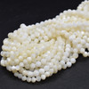 High Quality Grade A Natural Mother of Pearl Semi-Precious Gemstone FACETED Round Beads - approx 4mm - 14" long