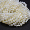 High Quality Grade A Natural Mother of Pearl Semi-Precious Gemstone FACETED Round Beads - approx 4mm - 14" long