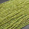Natural Peridot Semi-Precious Gemstone FACETED Round Beads - approx 4mm - 15" long Natural Peridot Semi-Precious Gemstone FACETED Round Beads - approx 4mm - 15" long