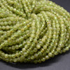 Natural Peridot Semi-Precious Gemstone FACETED Round Beads - approx 4mm - 15" long Natural Peridot Semi-Precious Gemstone FACETED Round Beads - approx 4mm - 15" long