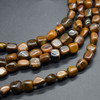 High Quality Grade A Natural Iron Tiger Eye Semi-precious Gemstone Pebble Tumbledstone Nugget Beads - approx 5mm - 8mm - 15" long strand