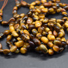 High Quality Grade A Natural Tiger Eye Semi-precious Gemstone Pebble Tumbledstone Nugget Beads - approx 5mm - 8mm - 15" long strand