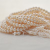 High Quality Grade A Natural Freshwater Near Round Pearl Beads - approx 6mm - 7mm - 14.5" long