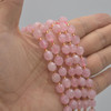 Grade A Natural Rose Quartz Semi-precious Gemstone Double Tip FACETED Round Beads - 7mm x 8mm - 15" strand