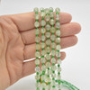 Grade A Natural Prehnite Semi-precious Gemstone Double Tip FACETED Round Beads - 5mm x 6mm - 15" strand