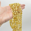 Grade A Natural Yellow Opal Semi-precious Gemstone Double Tip FACETED Round Beads - 6mm x 7mm - 15" strand