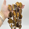 High Quality Grade A Natural Tigers Eye Semi-precious Gemstone Irregular Slices Pendant / Beads - 15" strand