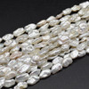 High Quality Grade A Natural Freshwater White Biwa Souffle Pearl Beads - approx 14mm - 18mm x 7mm-9mm - 14'' strand