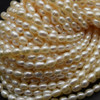 Natural Freshwater Rice Pearl Beads - Off White - 5mm - 5.5mm - 14'' Strand