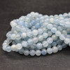 High Quality Grade AA Natural Pure Blue Calcite Semi-Precious Gemstone Round Beads - 6mm, 8mm sizes - 15'' Stand
