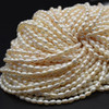 Natural Freshwater Rice Pearl Beads - White - approx 4mm - 5mm x 3mm - approx 14'' Strand