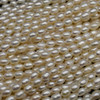 Natural Freshwater Rice Pearl Beads - Off White - approx 6mm - 7mm x 4mm - approx 14'' Strand