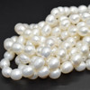 High Quality Grade A+ Natural Freshwater Rice Pearl Beads - White - approx 10mm - 11mm x 8mm - approx 14'' Strand