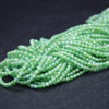 Cubic Zirconia FACETED Round Beads - Bright Green - 2mm - 15'' Strand