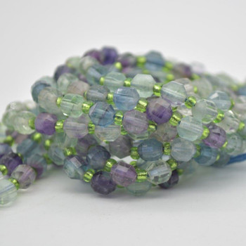 Grade A Natural Rainbow Fluorite Semi-precious Gemstone Double Tip FACETED Round Beads - 5mm x 6mm - 15.5" strand Grade A Natural Rainbow Fluorite Semi-precious Gemstone Double Tip FACETED Round Beads - 5mm x 6mm - 15.5" strand