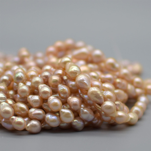 High Quality Grade A Natural Freshwater Baroque Teardrop Pearl Beads - Orange Iridescent Hue - 14" long