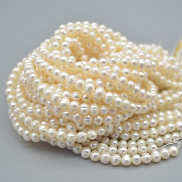 High Quality Grade B Natural Freshwater Potato Round Pearl Beads - White - 5mm - 6mm - 14" strand